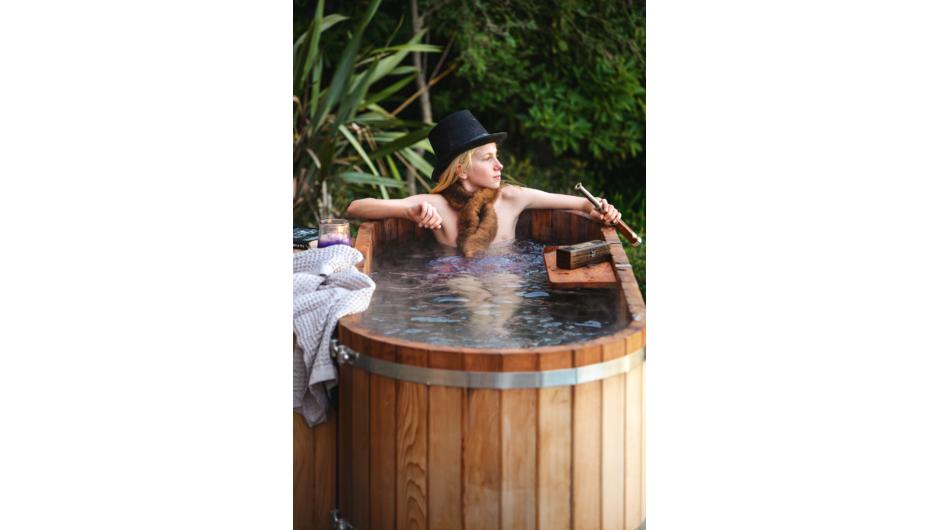 Our son Bede enjoying the cedar hot tub that&#039;s really made for grownups.