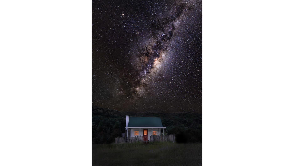 Our historic colonial cottage under the milky way.