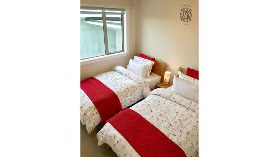 Our second option is two single king sized beds with the shared bathroom.  We offer a 2 bedroom suite.  If you have more than two in your party please contact us for accommodation options as this additional room is available.