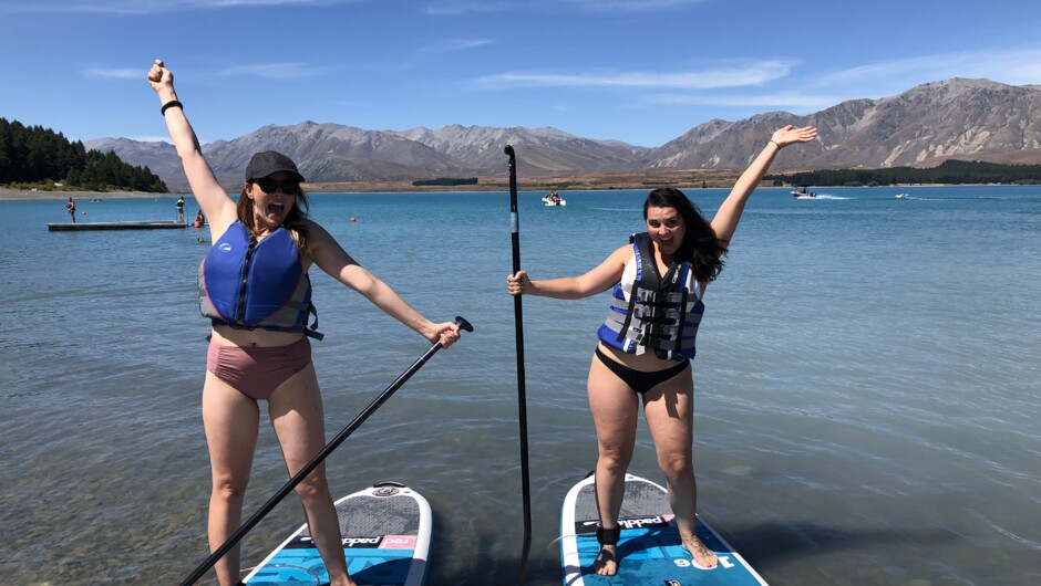 Girls enjoying their first time paddle boarding