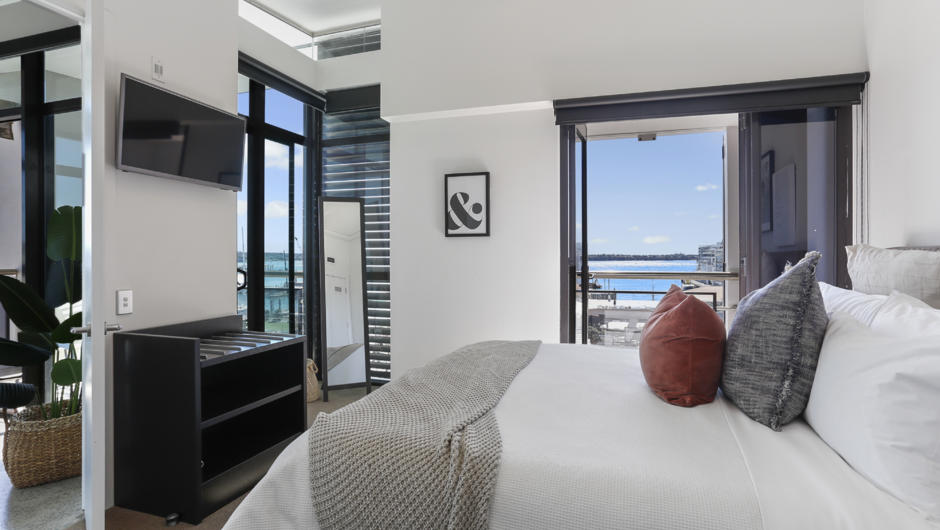 Enjoy gorgeous water views right from your bed.