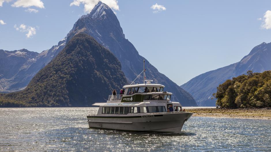 Finish your day with a boat cruise on Milford Sound to see the iconic Mitre Peak and other highlights from sea level.