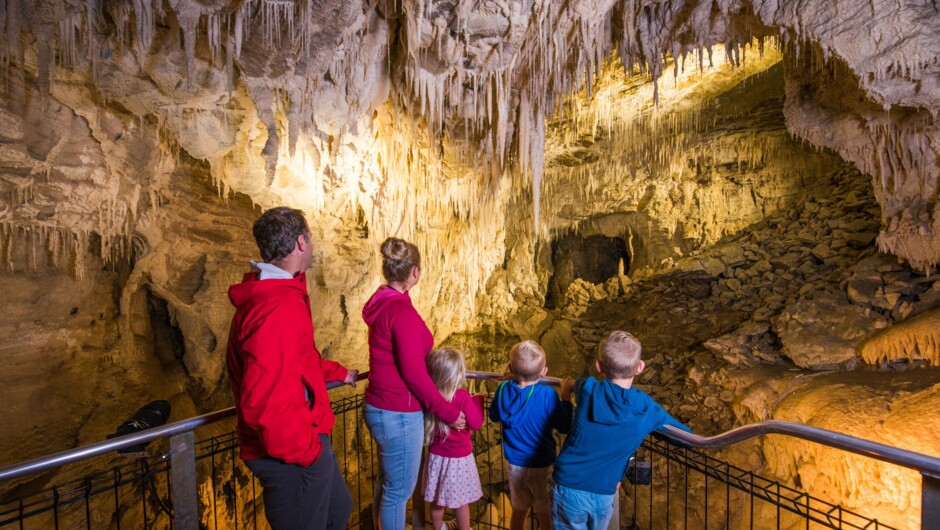 Family admiring the stunning cave formations.