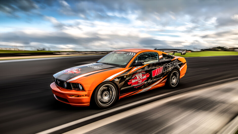 Take your turn behind the wheel of the Repco 5L V8 production-based Mustang race car. Our professional driver will guide you through 5 laps teaching you the ‘racing line’ and help guide you through an adrenalin-filled experience.