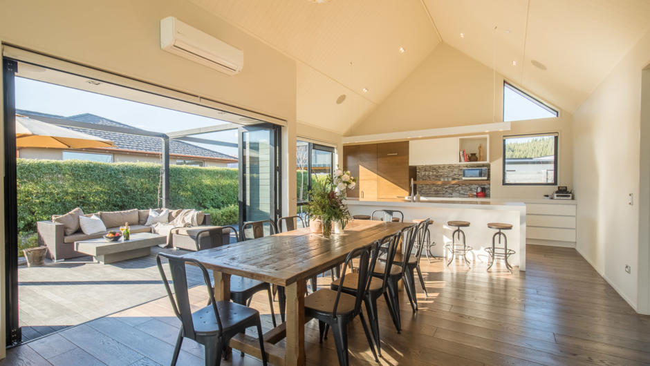 Spacious dining area opens out on the deck to maximise the sun in the summer months.