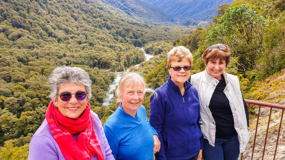 MoaTours guests at the Hollyford Valley lookout on the Milford Road