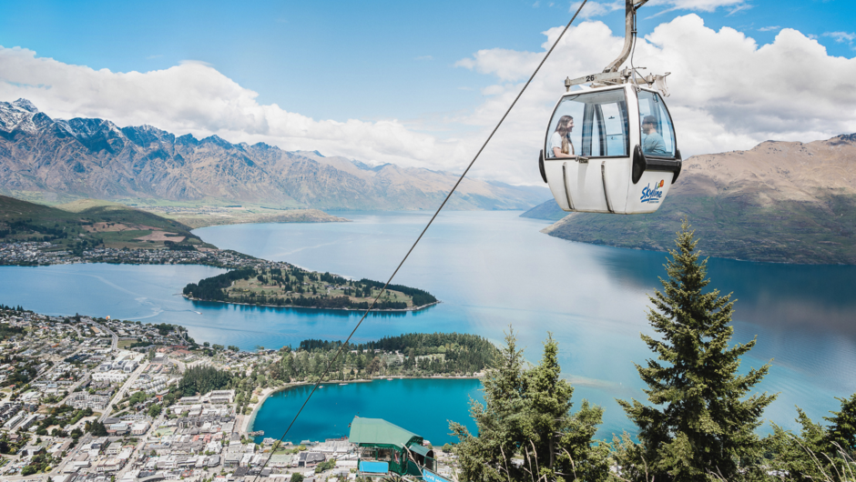 A Gondola cabin reaches the top of its journey high above Queenstown.