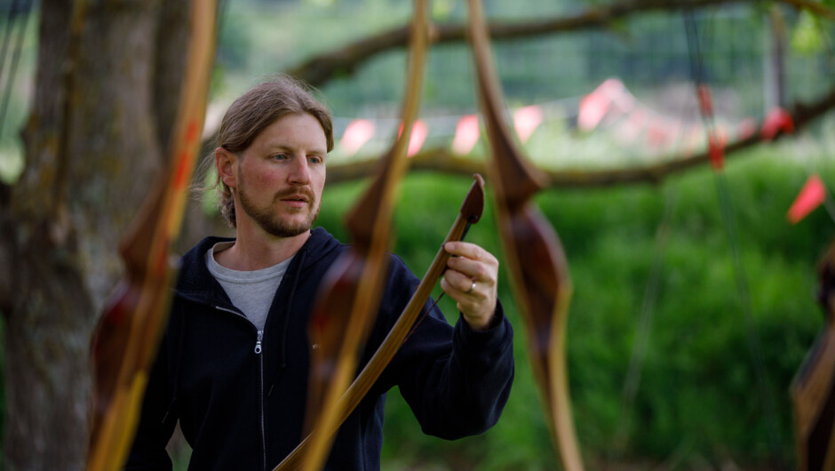 Learn to shoot the longbow - the right bow to go on a Dragon Hunt.