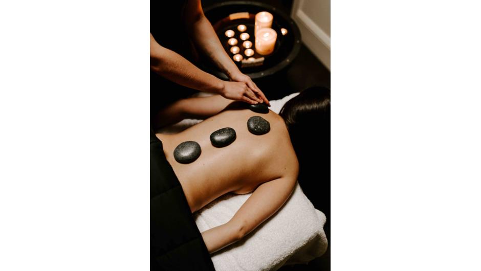 Warm up with our specialty Hot Stone massage
