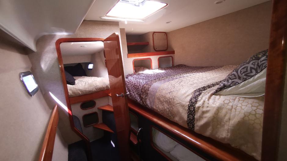 Comfortable innerspring double beds in both cabins. Dual W/C aboard.