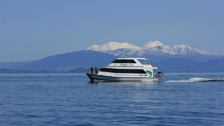 Chris Jolly Outdoors Super Cat on Lake Taupo with Mt. Ruapehu in the background