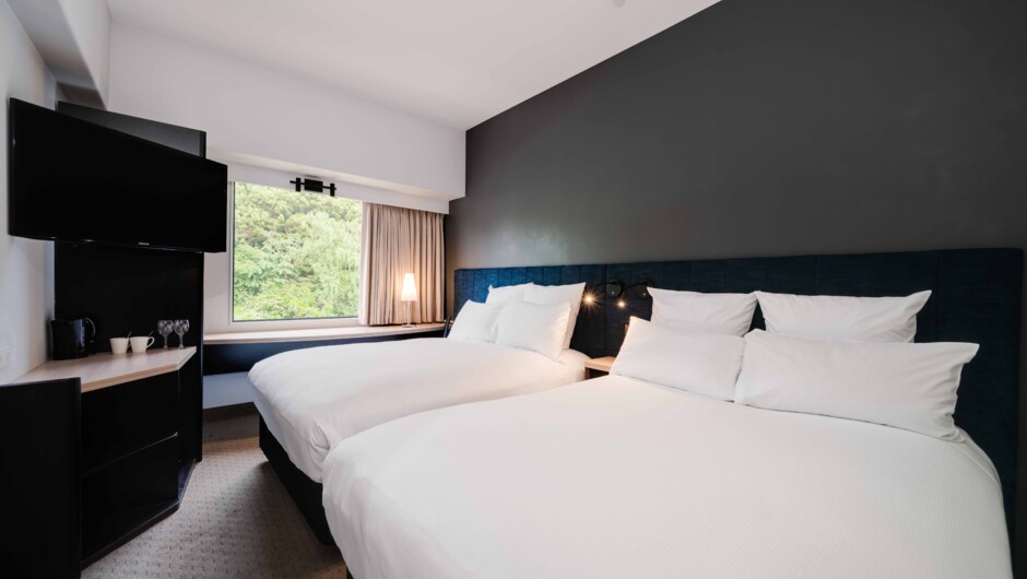 Standard twin rooms have views of Rotorua City, two double beds, an ensuite, TV with in-room movies, airconditioning, high-speed internet access and soundproofed windows.