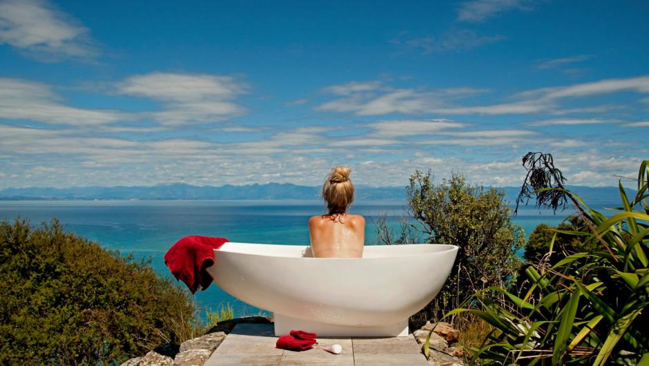 Outdoor bath tub, panoramic view of Tasman Bay
