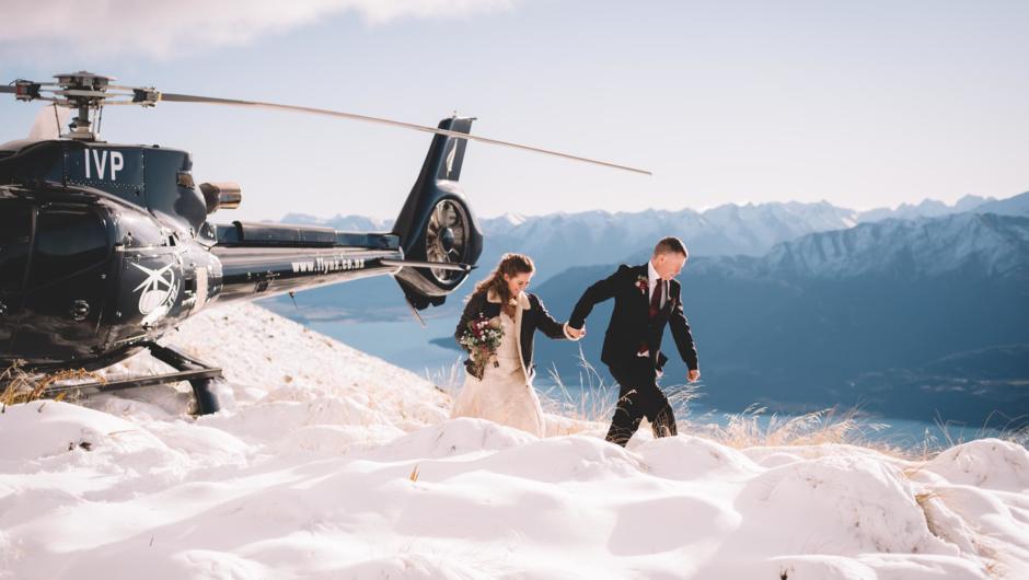 Aussie newly-weds Joanne and Darren took a helicopter flight to The Ledge, a stunning spot on Cecil Peak for some photos in ankle deep fresh white snow.  What an amazing day.