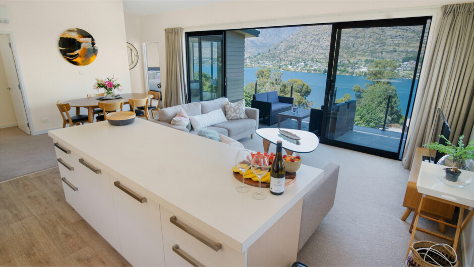 Kitchen to living area with 180 degree views of the lake and mountains.