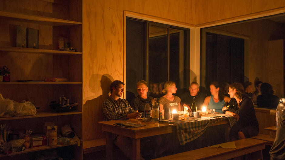 Candlelit dinner in a backcountry hut