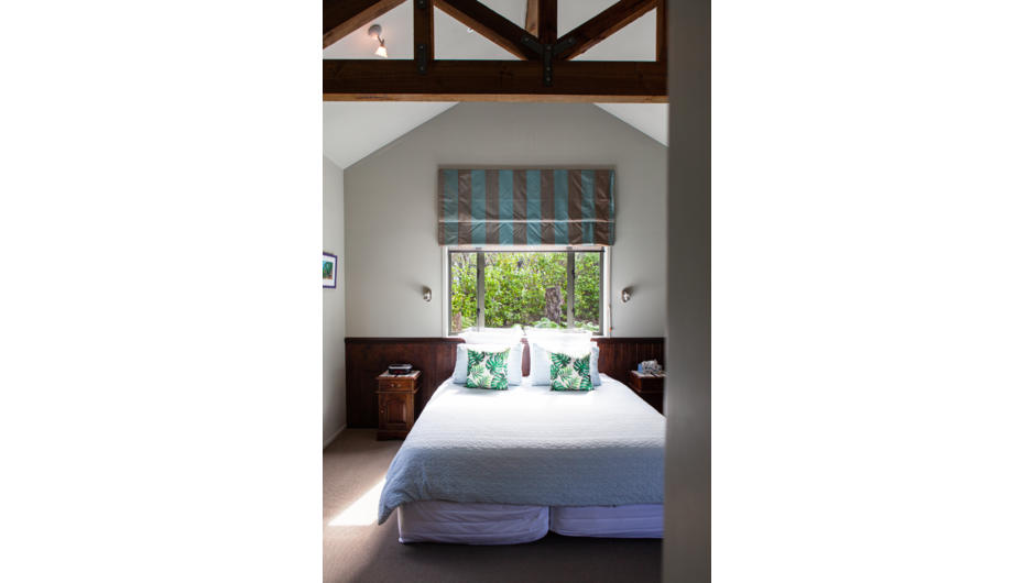 Each of the four bedrooms at Orokawa Bay Retreat offers King or twin king-single beds, with wall to ceiling tiled ensuite bathrooms that are fully accessible.