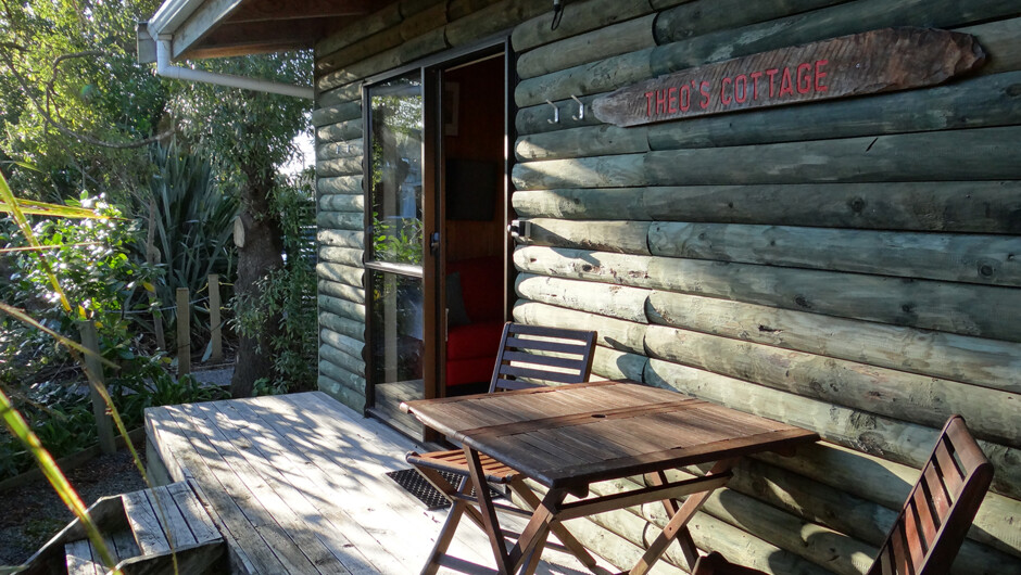Theo's Cottage has a small deck to enjoy the views on sunny days