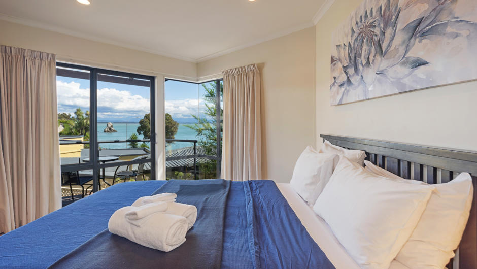 Master bedroom with private balcony & views on Fifeshire Rock