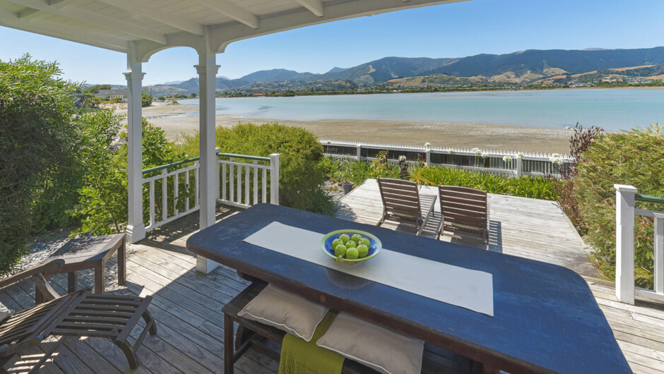 Keeping an eye on the tide from the sunny deck