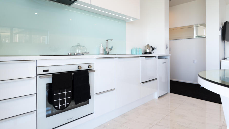 Beautiful modern kitchen with full oven & stove, dishwasher, washing machine & fridge.