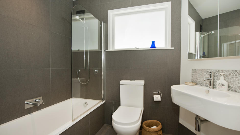 Shower over bath, toilet &amp; basin. Beautifully renovated with frameless showers, beautiful tiles &amp; underfloor heating
