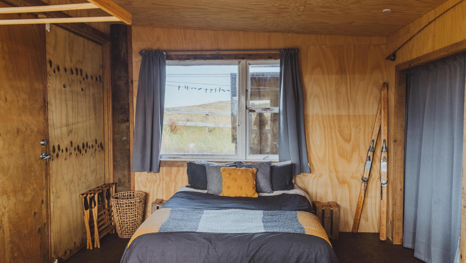 Safe haven. Rest on the queen size bed, relax on the sofa by the fire, or chill outside under the ‘lean-to’ porch with a drink. The hut provides a safe haven for all seasons.