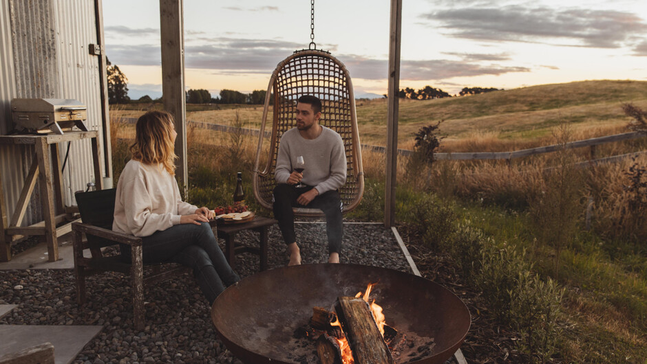 Outdoor space. Ideal for enjoying long afternoons, epic western sunsets and starry nights, with a fire pit, outdoor seating &amp; table, BBQ and a pergola.