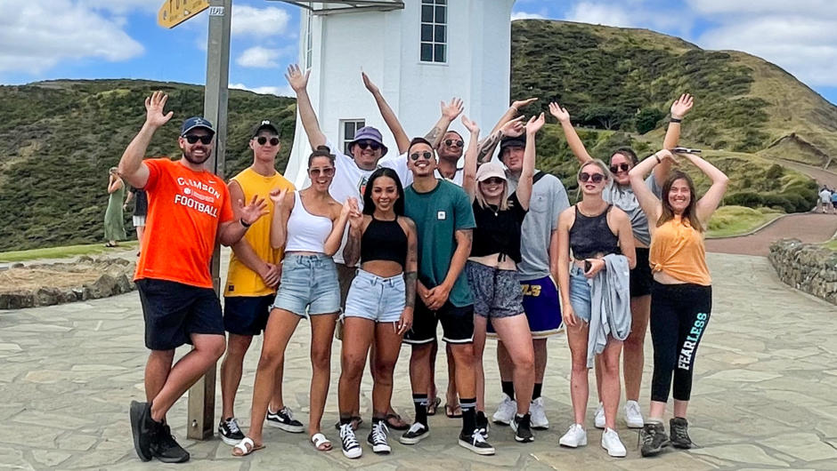 Group photo on day 3 at top of NZ (Cape Reinga)