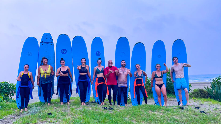 Group surfing lesson at the famous 90 mile beach in Ahipara