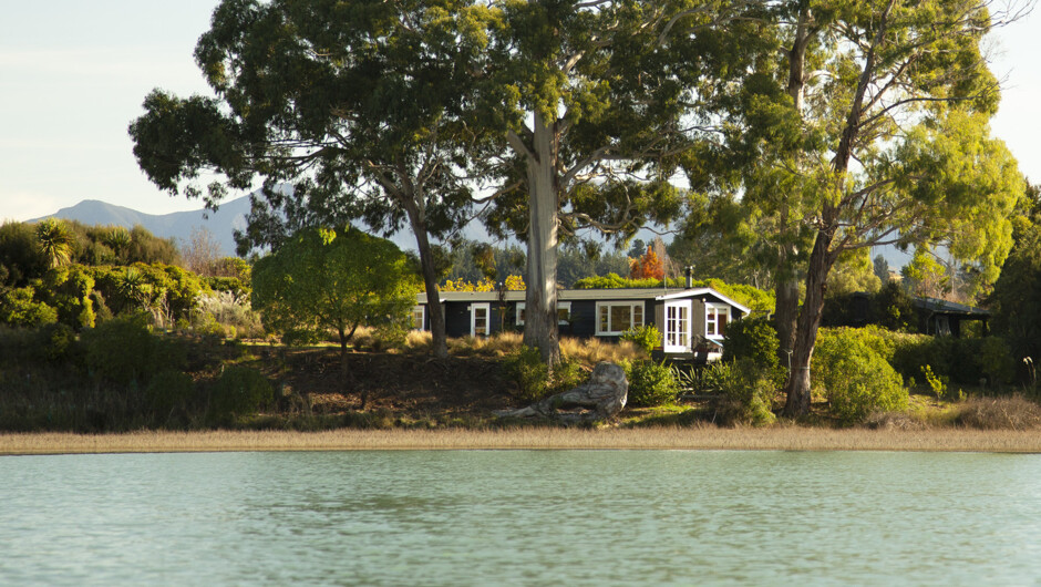 The Apple Pickers' Cottages  from Waimea Inlet