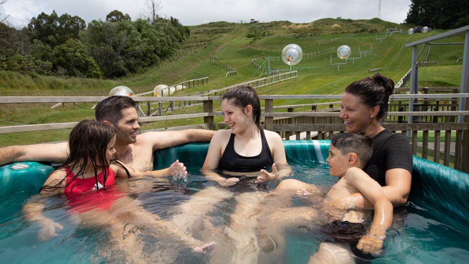 Hot tubs at the top and the bottom of the hill to relax in during and after your ZORB rides