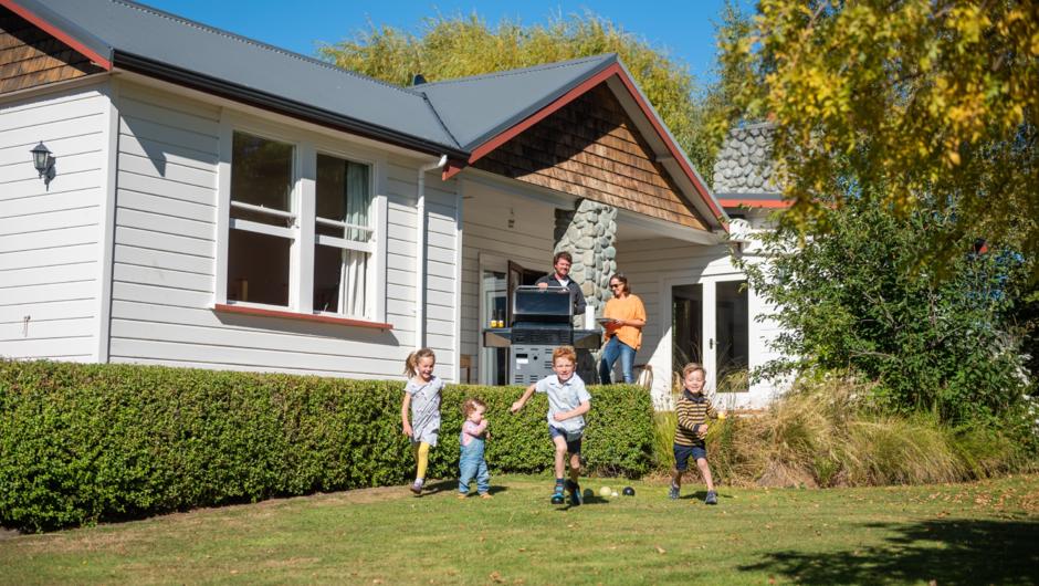 The Mt John Homestead is surrounded by lawns, gardens and outdoor seating, with plenty of space for dining and entertaining outside, and for the kids to play.