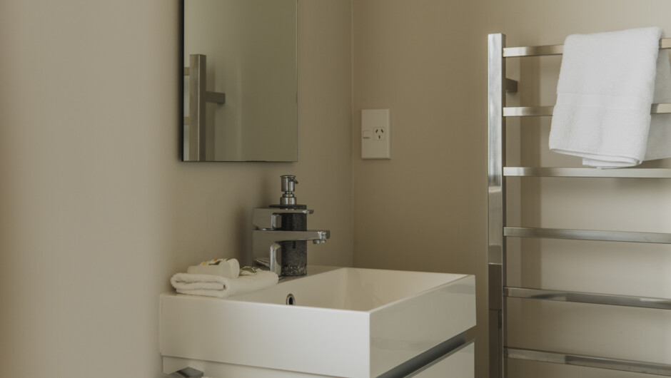 The boutique accommodation includes a tidy ensuite bathroom.
