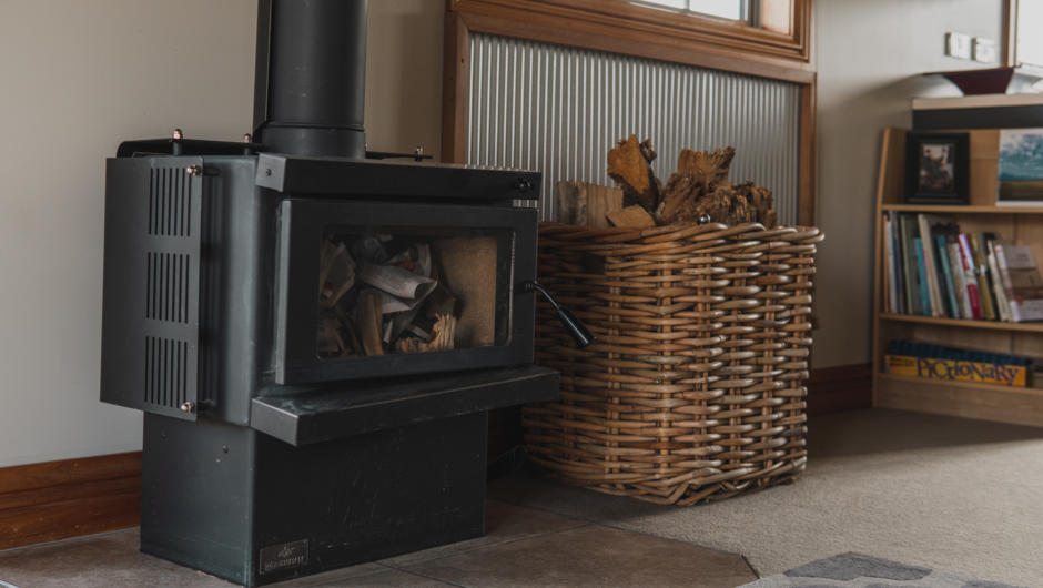 The cottage is cosy and warm, with a wood-burning fireplace.