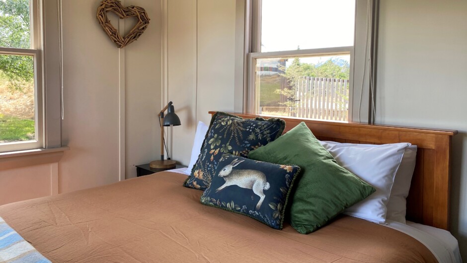The Red Hut features a super king bed and sleeps up to two guests.