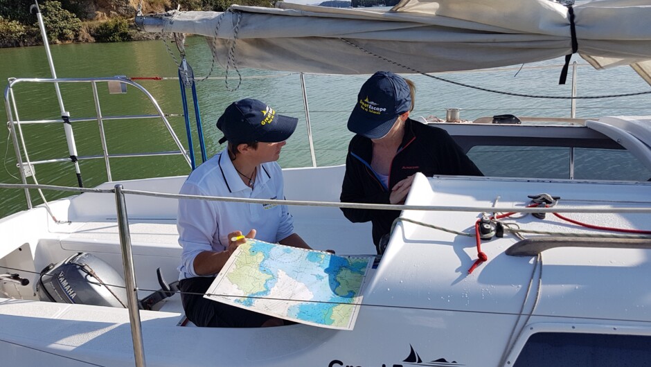 Checking the chart and planning the day's sailing before casting off