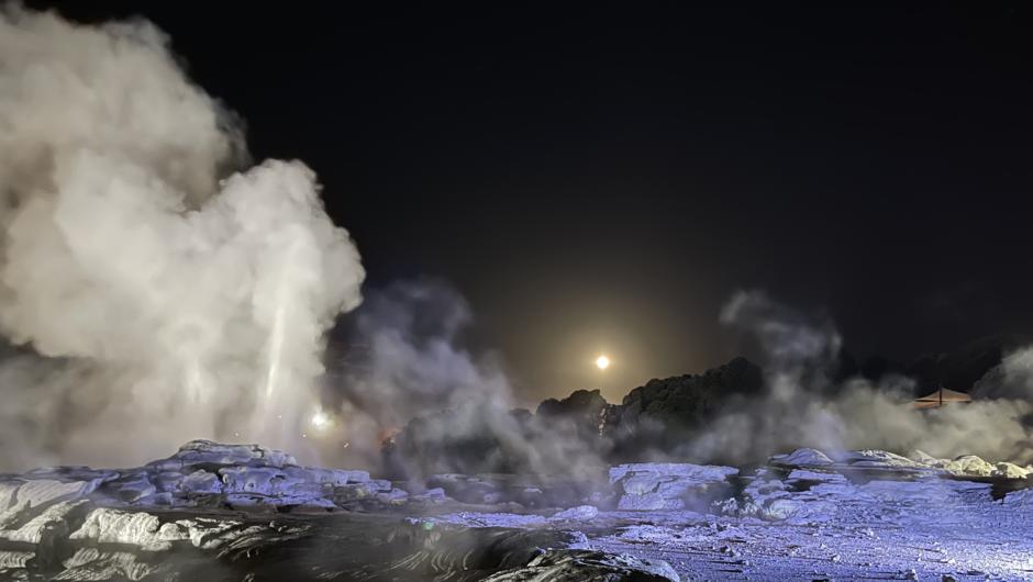 Pōhutu erupting lit for Geyser By Night.
