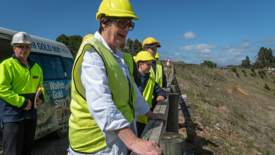 Stand right on the rim of the open-pit mine.