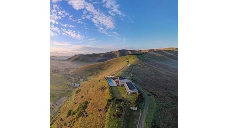 Mountainview Villa Luxury Lodge has a picturesque 360 degrees view as seen from this aerial photo.