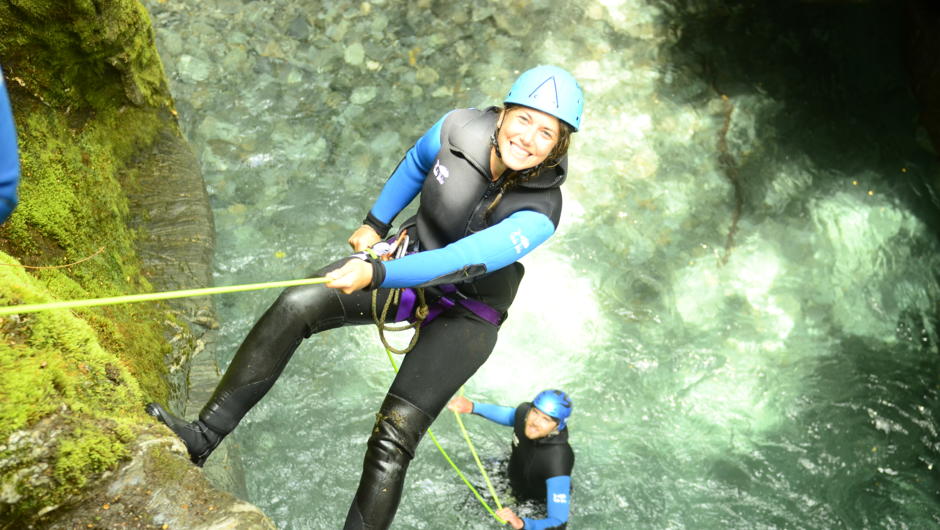 Abseiling down the canyon