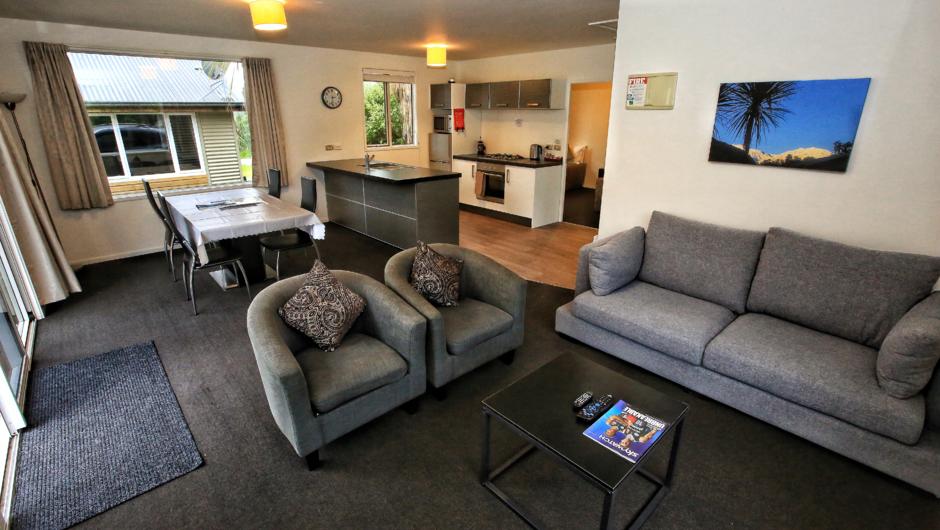 Living area of our one or two bedroom chalet. Large space and full kitchen facilities.