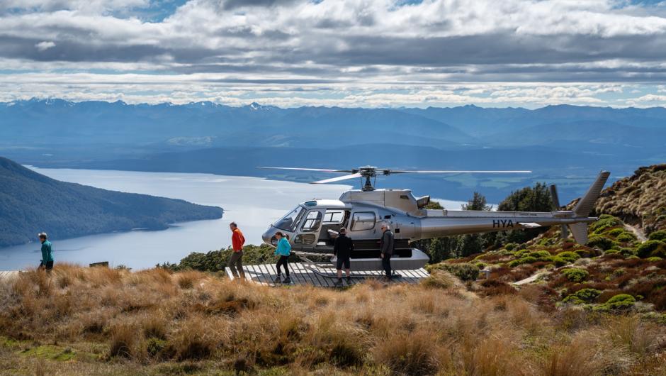 Land at Luxmore Hut by helicopter to begin your hike on the Kepler Track.
