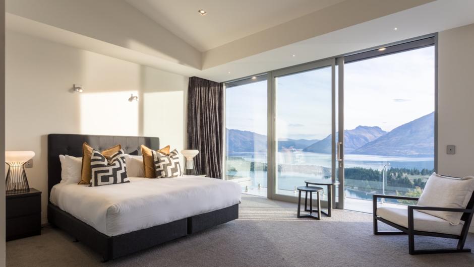 Luxurious master bedroom with private balcony