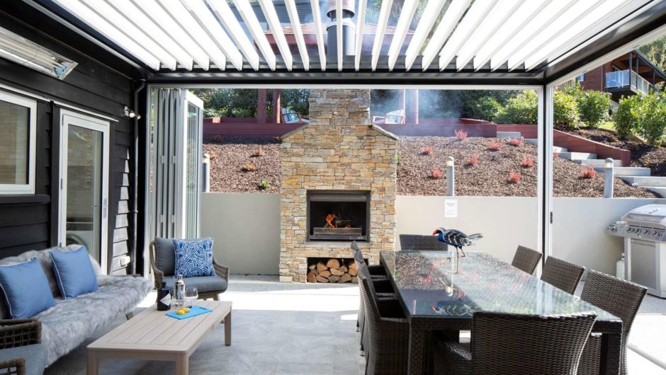 Great outdoor living with a fireplace, BBQ and retractable roof