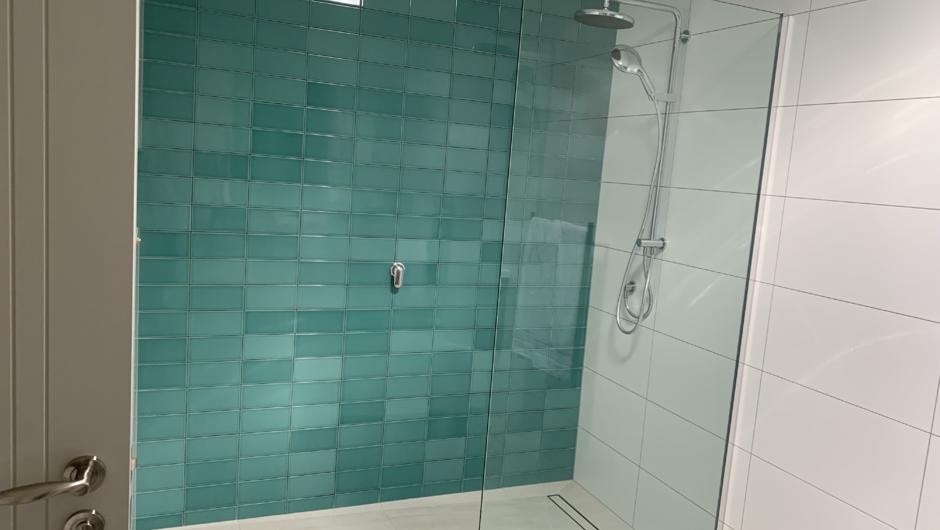 Both suites feature these large impressive showers for your comfort.