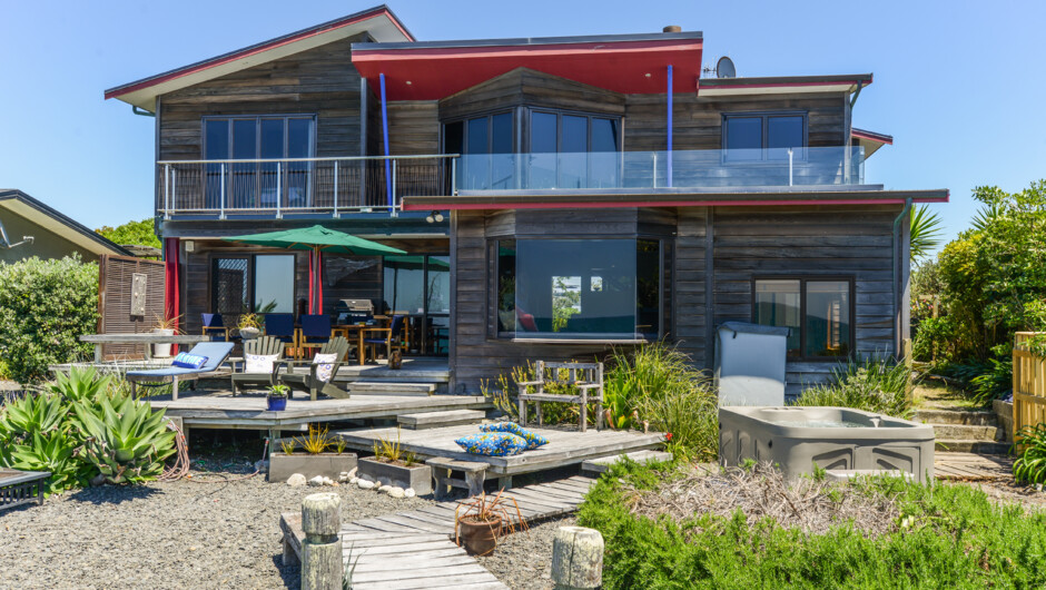 House on the beach showing out door relaxation area