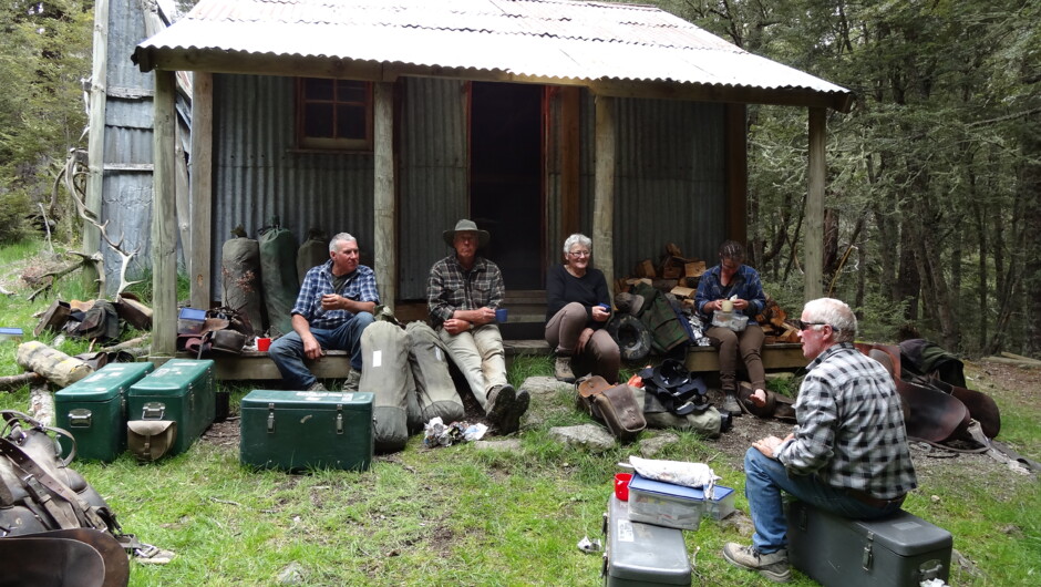 Relaxing at Cattle Creek Hut on Mt White Station.