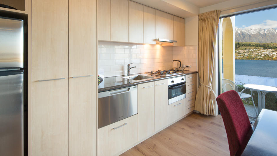 1 Bedroom Suites modern kitchen with all amenities - outdoor terrace, full laundry and full kitchens.