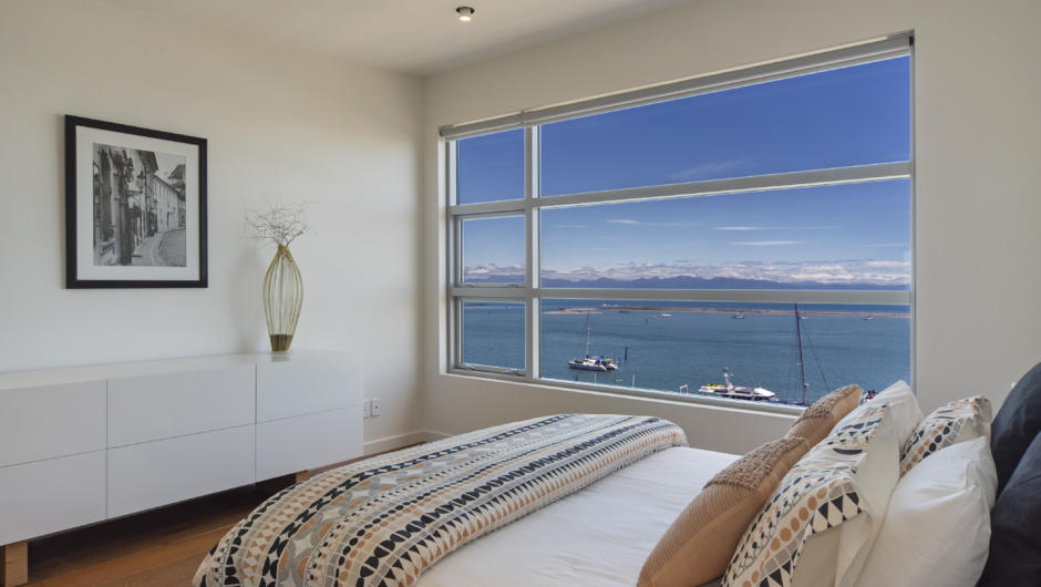 Master bedroom with Queen bed & sea views